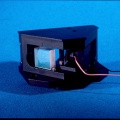 Miroir à conjugaison de phase auto pompé pour la correction des faisceaux lasers